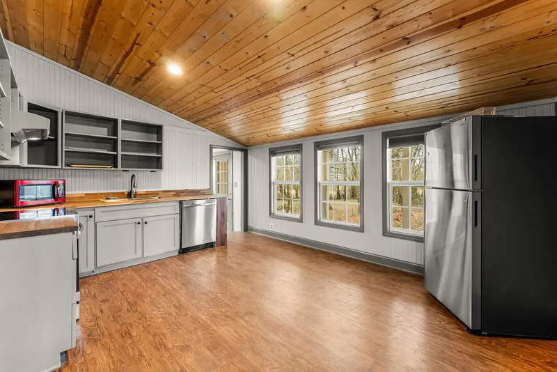 Kitchen with wood-plank ceiling and butcher block counters